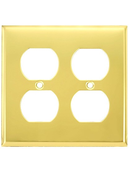 Classic Double Duplex Cover Plate In Polished Brass.